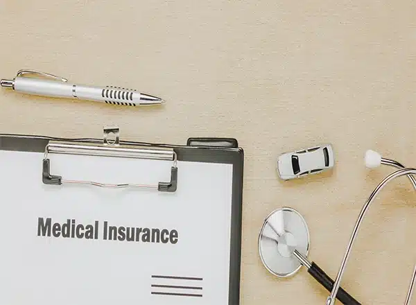 Medical insurance paperwork and tools