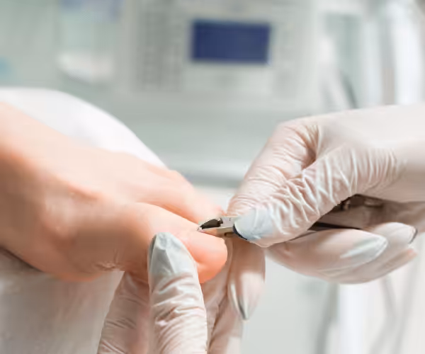 Podiatrist examining a new patient at Balance Foot and Ankle in Michigan