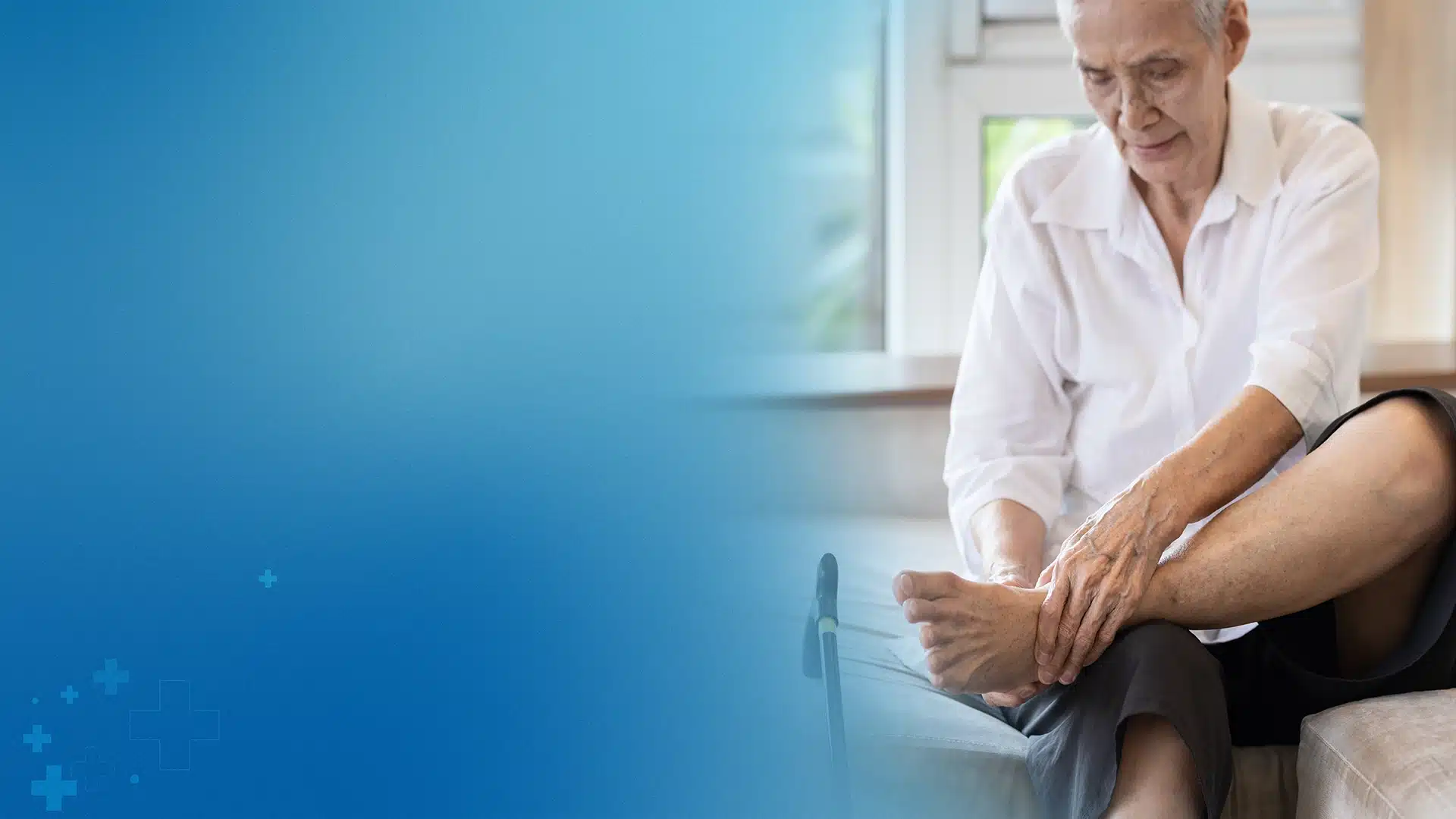 An elderly woman with a cane nearby sits and touches her ankle and foot with a pained or concerned expression, visually representing discomfort, potential nerve damage, or warning signs of neuropathy in seniors.
