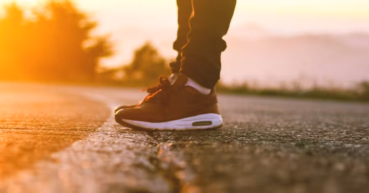 Modern running sneaker on a road at sunset — On Cloud shoes review, Balance Foot & Ankle, Howell MI