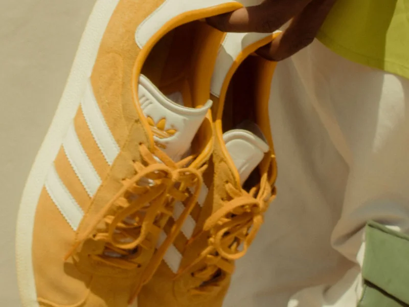 Checking a shoe's heel counter and upper for support before standing all day in it