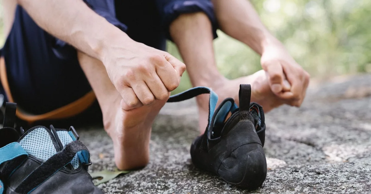 sudden foot pain without injury - podiatrist examining patient foot - Balance Foot & Ankle Howell MI